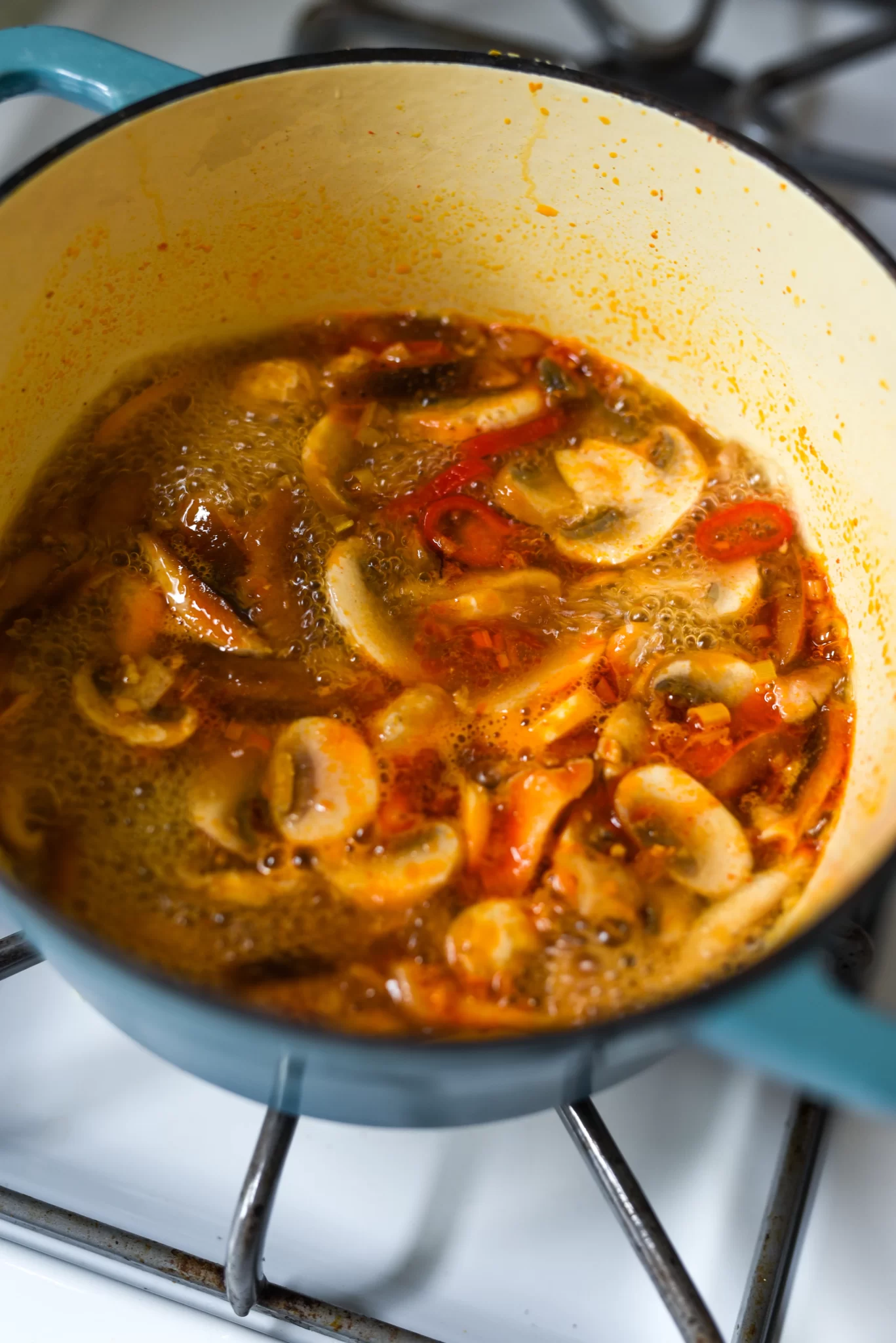 mushrooms cooking in pot