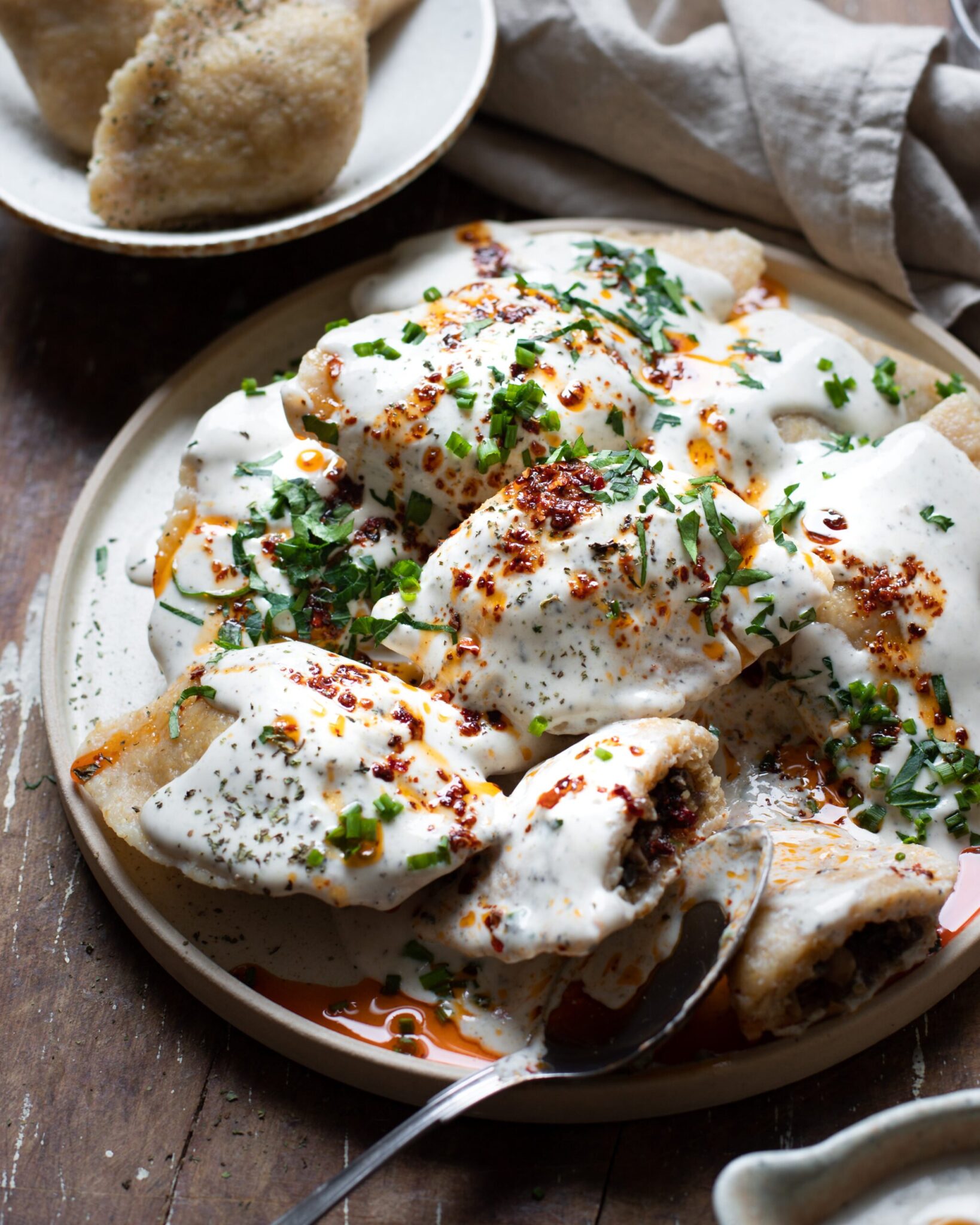 Vegan Kutilk (Kurdish Bulgur Dumplings in Warm Mint-Yogurt Sauce topped with Chili Butter)