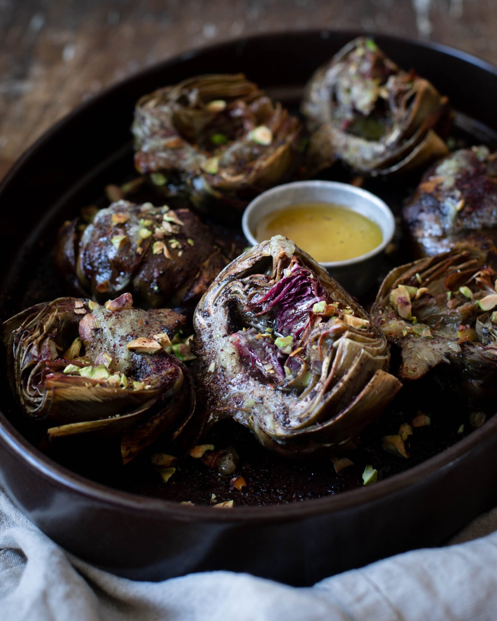 All About the Veg: Vegan Sumac Roasted Artichokes with Salted Pistachios & Roasted Garlic Butter
