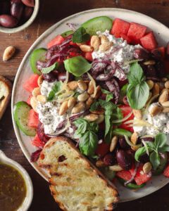 Vegan Watermelon Salad with Sumac Onions, Chunky Feta Dip and Tamarind & Preserved Lemon Dressing