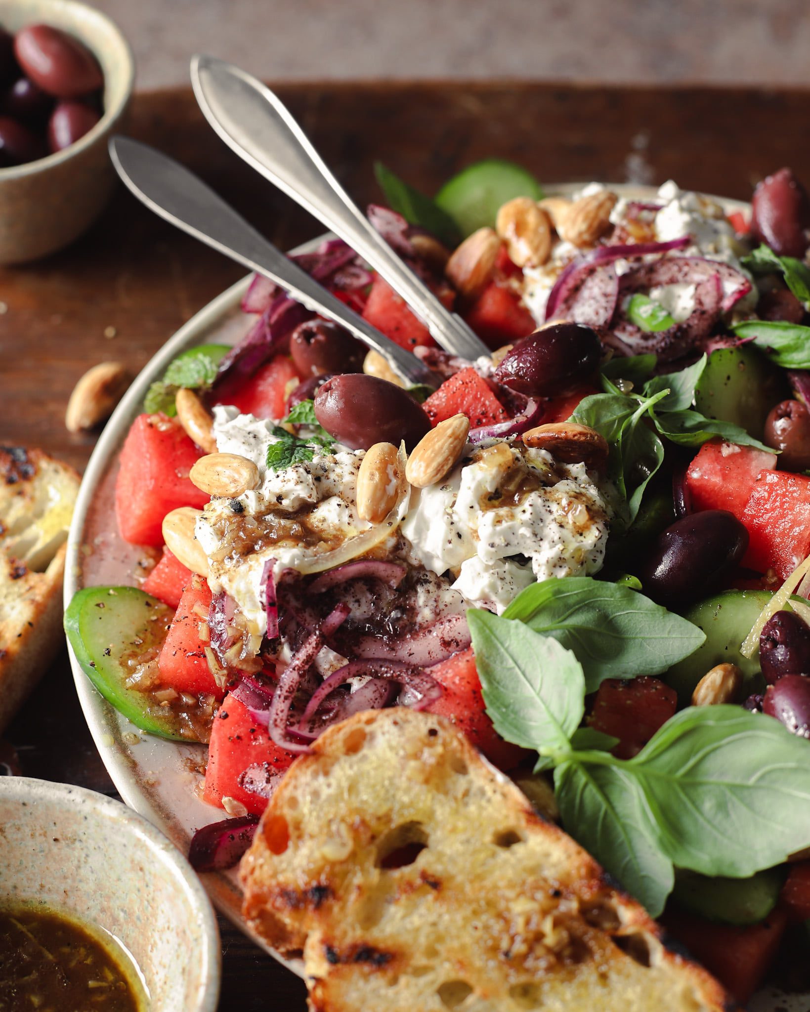 Vegan Watermelon Salad with Sumac Onions, Chunky Feta Dip and Tamarind & Preserved Lemon Dressing