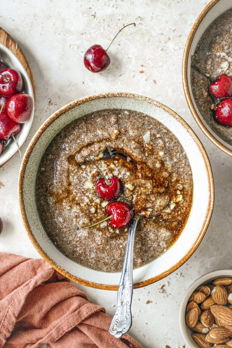 African teff porridge with cherries and syrup