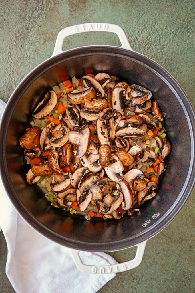 Mushroom Barley Soup - mushrooms in the pot