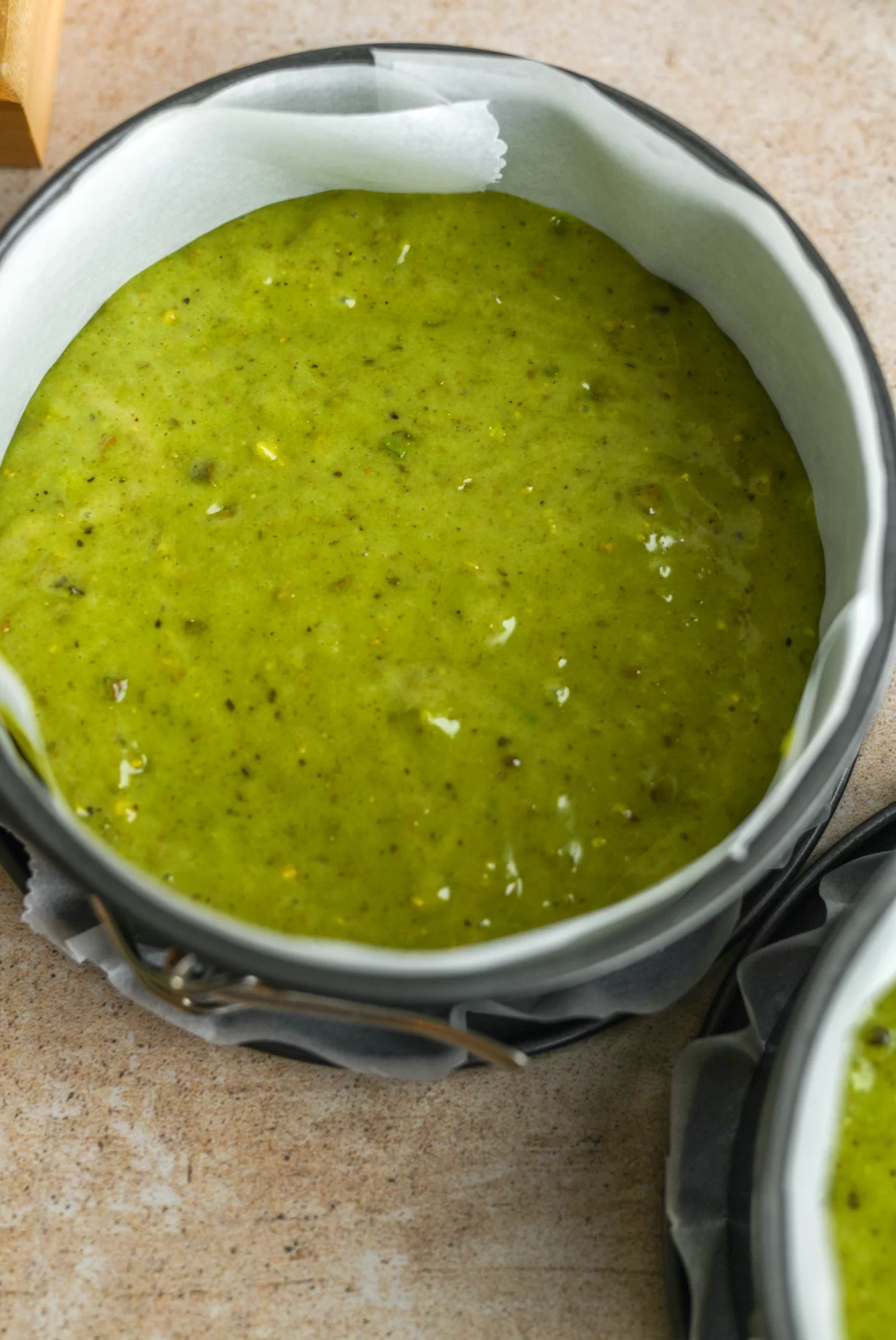 vegan pistachio cake batter in cake form