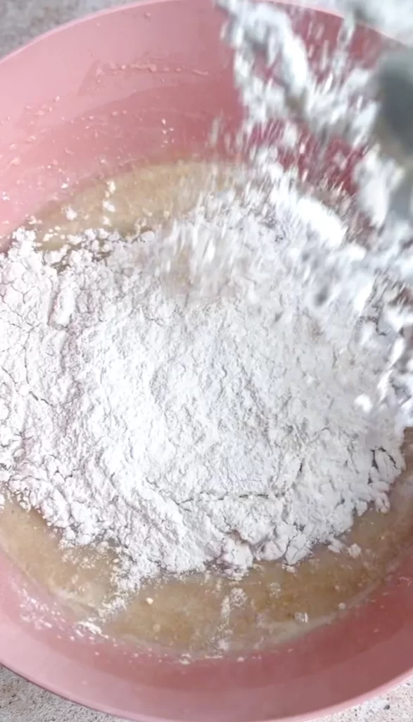 flour being added to bowl