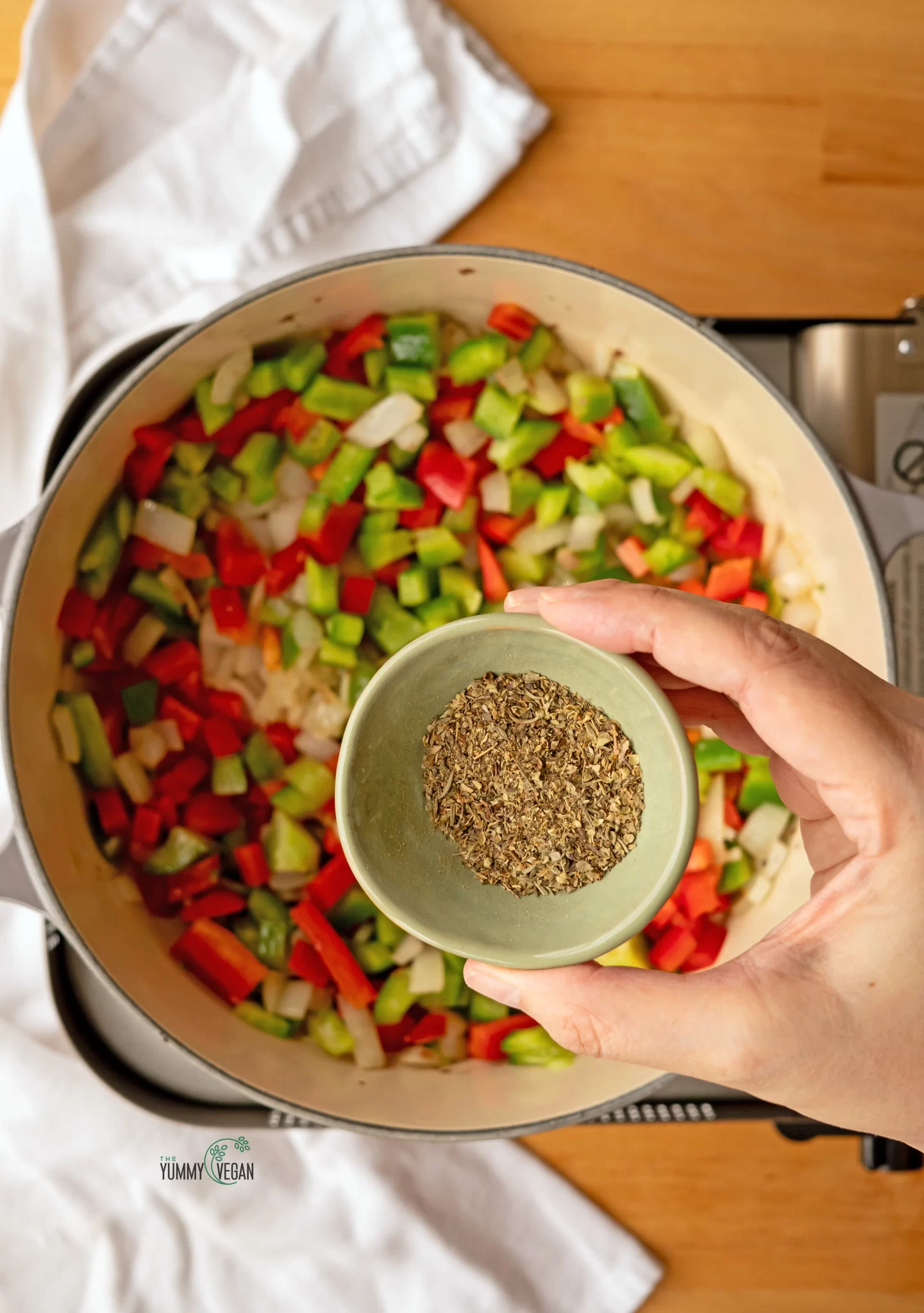 seasonings being added to pot