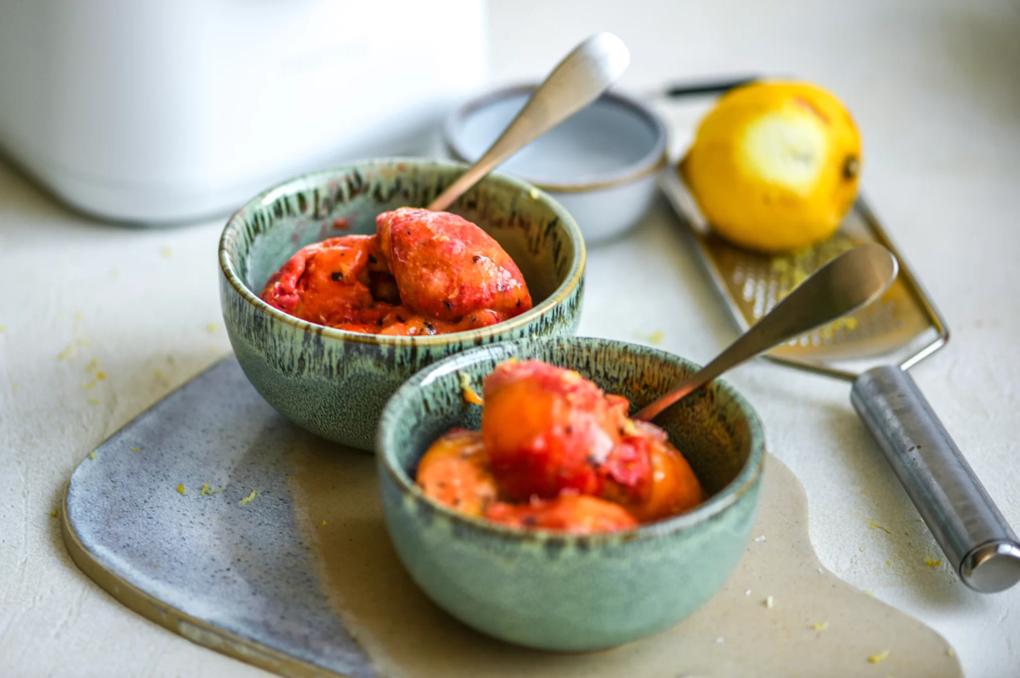 sorbet next to lemon and grater